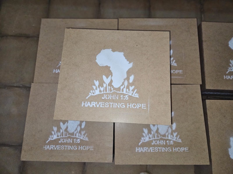 Harvesting Hope branded kraft boxes ready for delivery